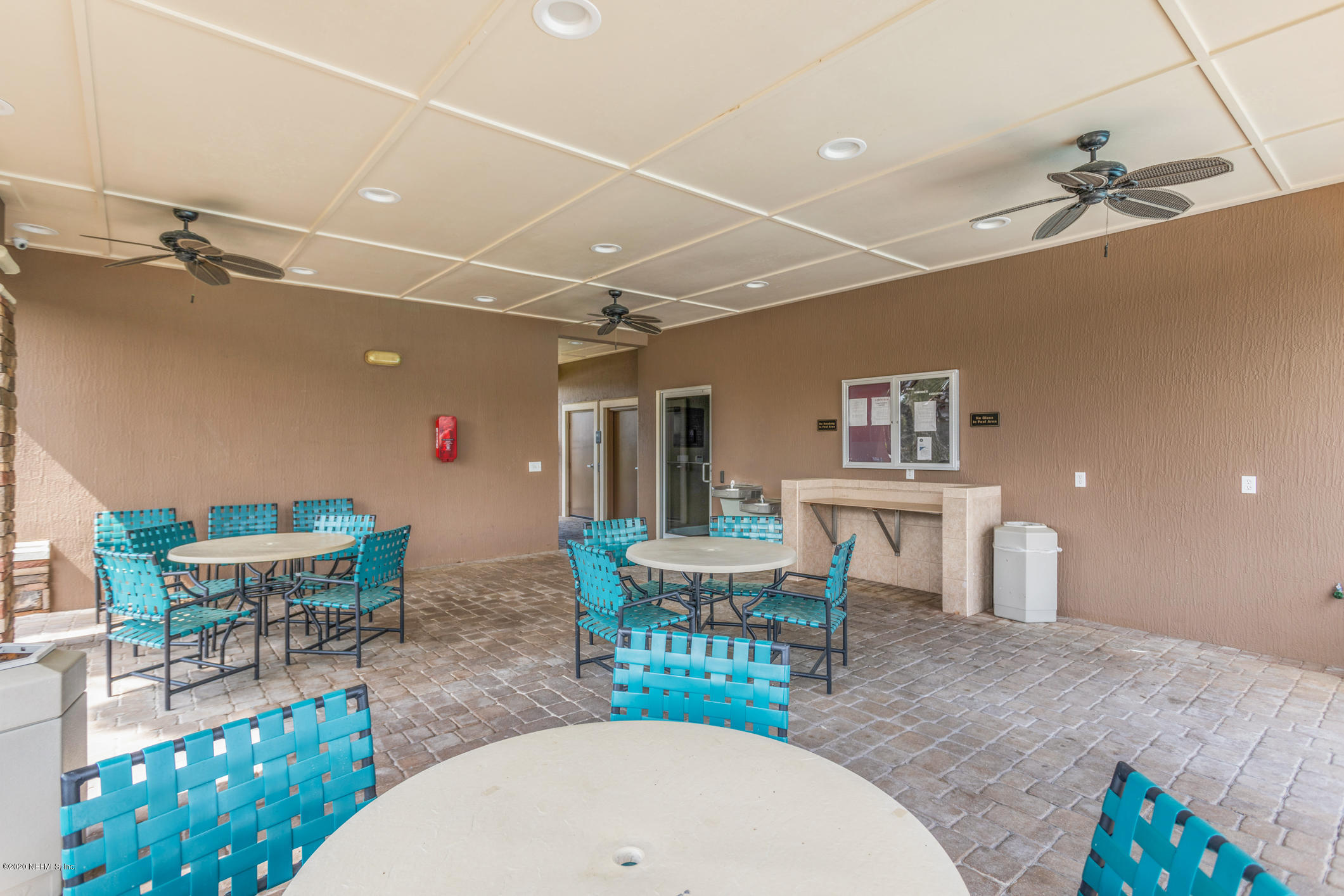 12940 Spring Rain Road Jacksonville, FL 32258 - Photo 18 of 20 a dining room with furniture and a chandelier