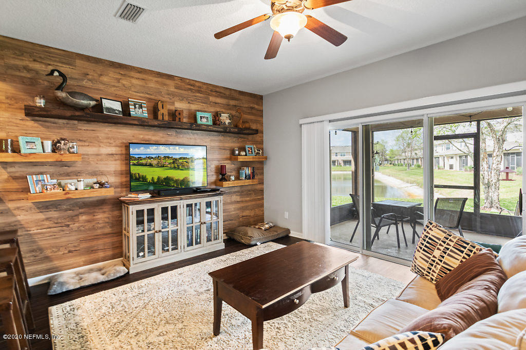 12940 Spring Rain Road Jacksonville, FL 32258 - Photo 2 of 20 a living room with furniture