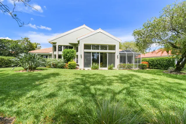 a view of a park with large trees