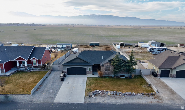 4319 Rose Springs Road Erda, UT 84074 - Photo 1 of 1 Aerial view of sparsely populated area with a mountainous background