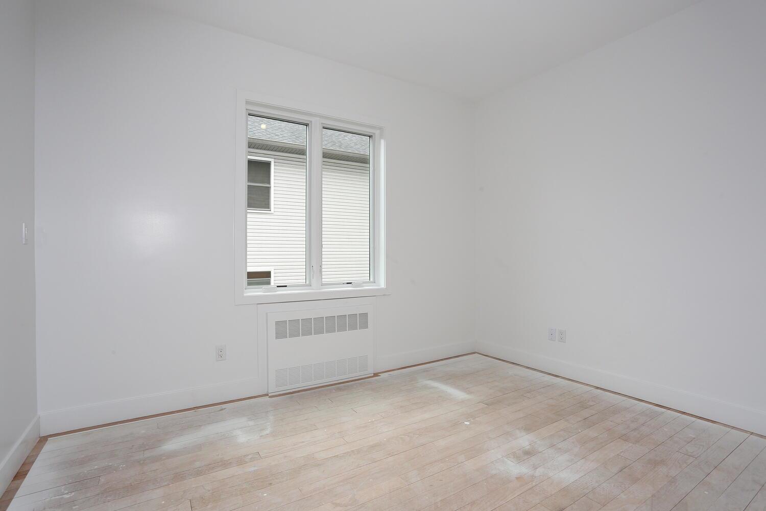 37 Ewing Avenue, Unit 202 Spring Valley, NY 10977 - Photo 16 of 44 an empty room with a window