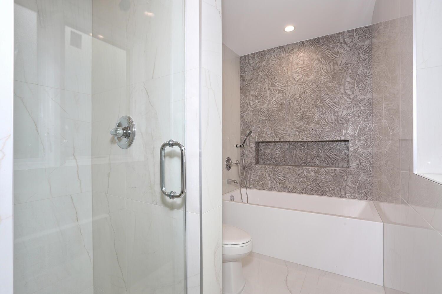 37 Ewing Avenue, Unit 202 Spring Valley, NY 10977 - Photo 22 of 44 a bathroom with a shower and toilet