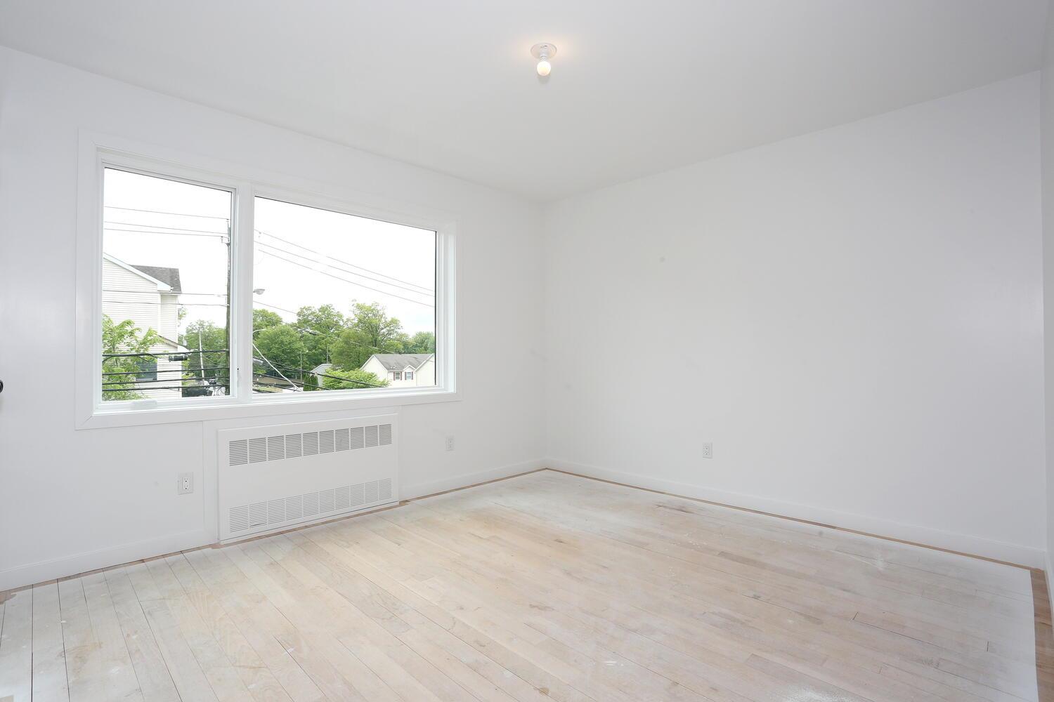 37 Ewing Avenue, Unit 202 Spring Valley, NY 10977 - Photo 24 of 44 an empty room with a window