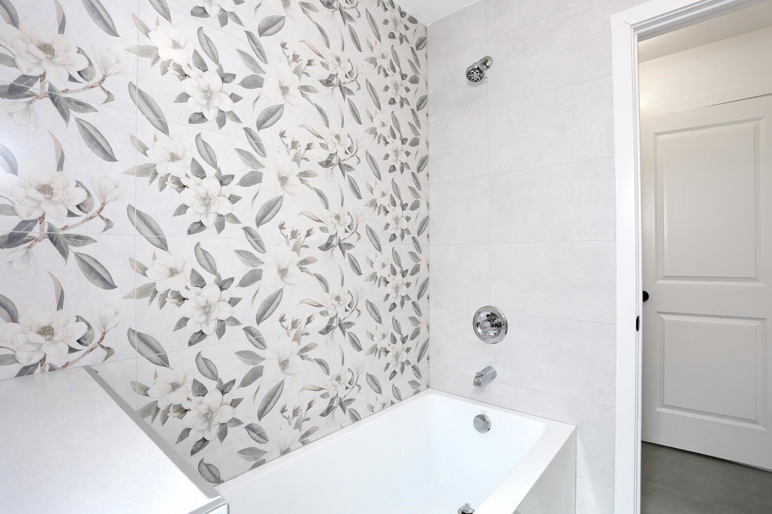 37 Ewing Avenue, Unit 202 Spring Valley, NY 10977 - Photo 27 of 44 a bathroom with a bathtub and shower