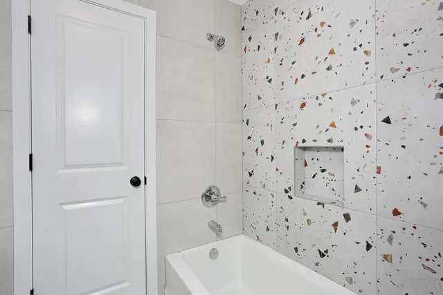 a bathroom with a bathtub