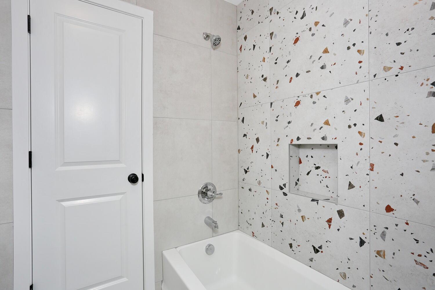 37 Ewing Avenue, Unit 202 Spring Valley, NY 10977 - Photo 29 of 44 a bathroom with a bathtub