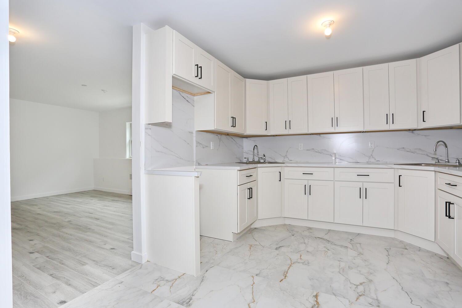 37 Ewing Avenue, Unit 202 Spring Valley, NY 10977 - Photo 34 of 44 a view of cabinets with wooden floor