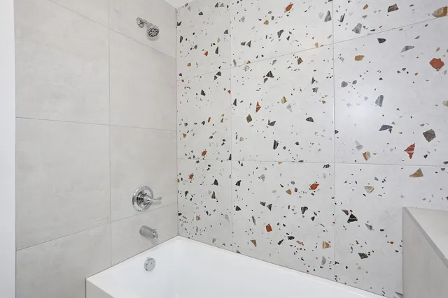 a bathroom with a bathtub