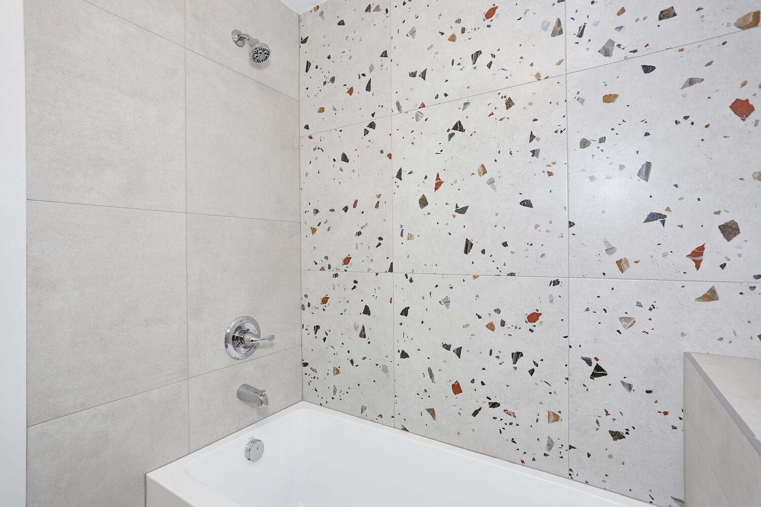 37 Ewing Avenue, Unit 202 Spring Valley, NY 10977 - Photo 43 of 44 a bathroom with a bathtub