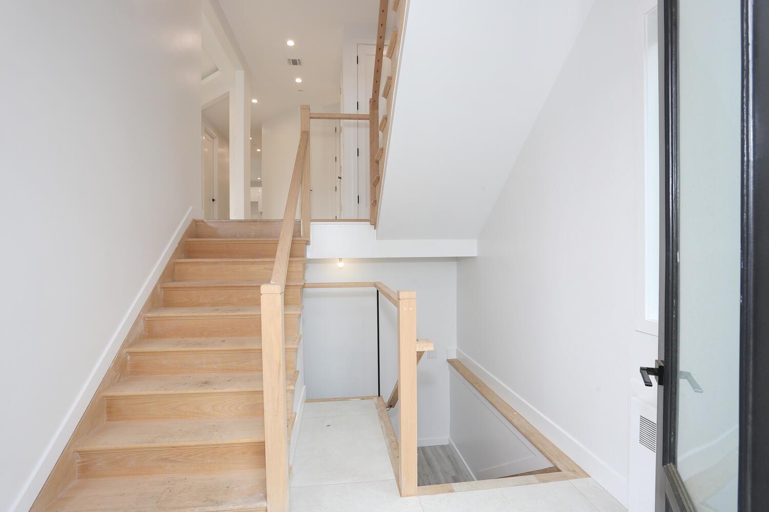 37 Ewing Avenue, Unit 202 Spring Valley, NY 10977 - Photo 6 of 44 a view of staircase with white walls and a window