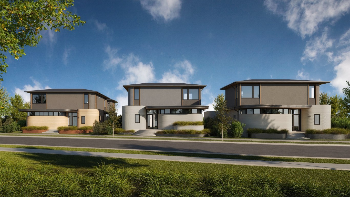 a front view of house with yard and outdoor seating