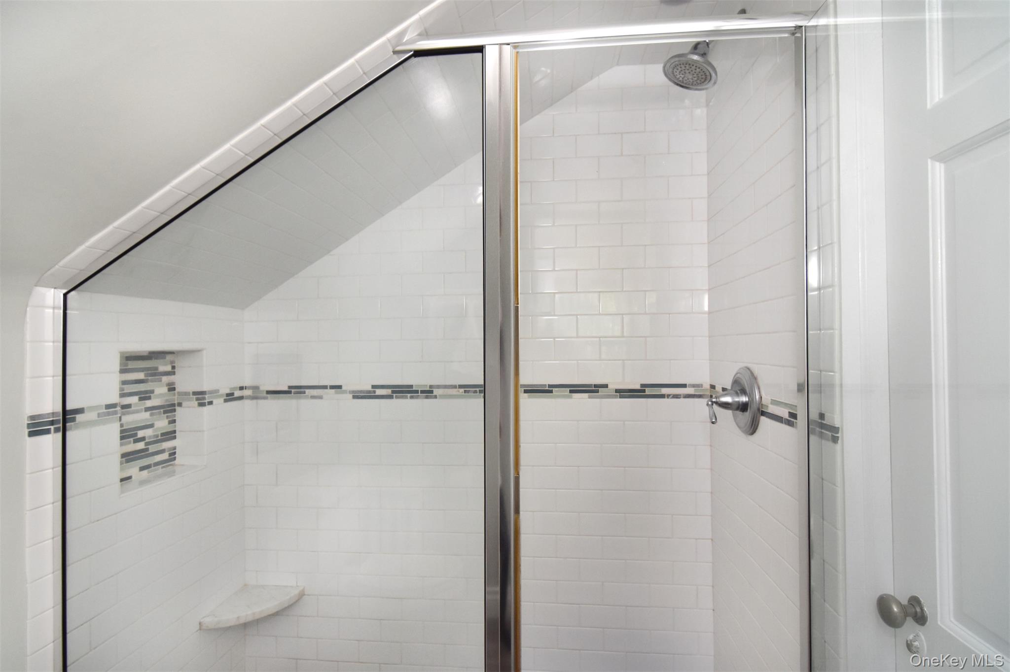 147 Midland Avenue Bronxville, NY 10708 - Photo 18 of 25 a bathroom with a shower