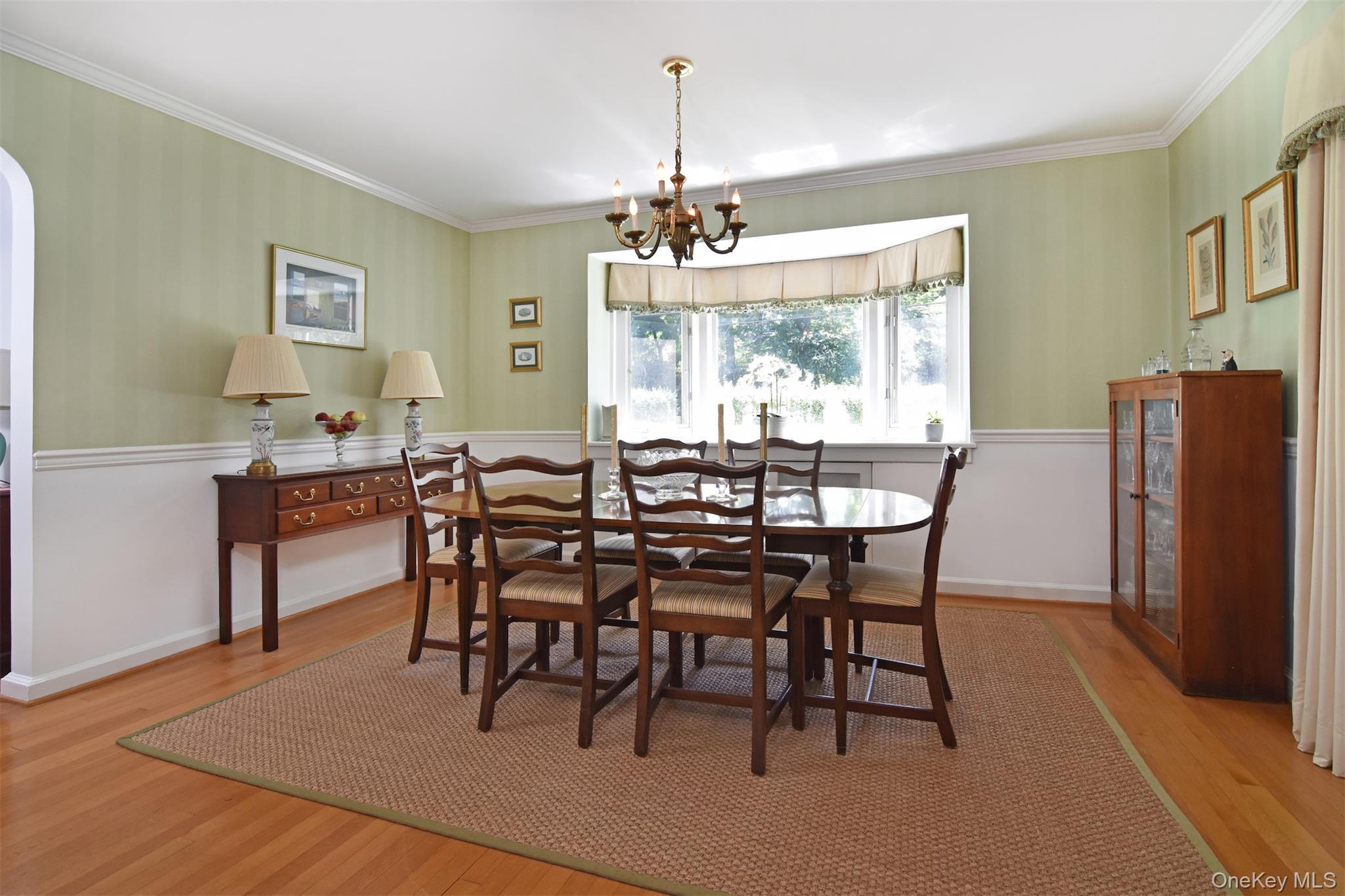 147 Midland Avenue Bronxville, NY 10708 - Photo 5 of 25 a view of a dining room with furniture window and outside view