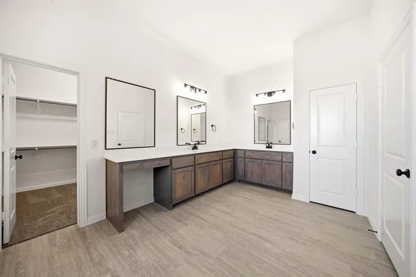 a view of an empty walk in closet