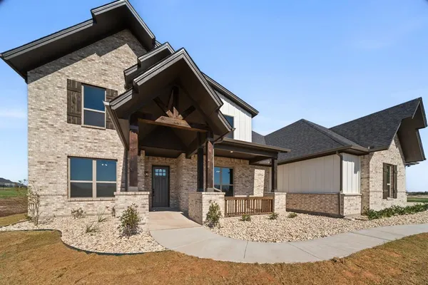 a view of a house with a patio