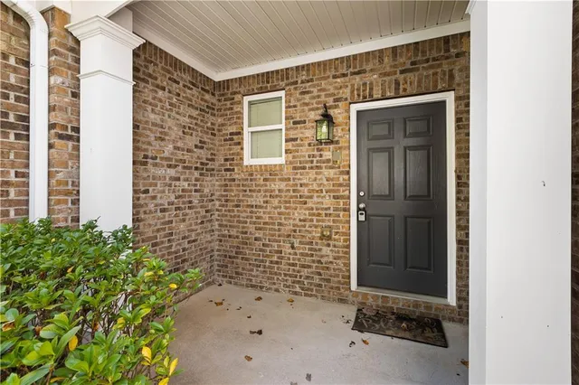 a bathroom with a toilet and shower