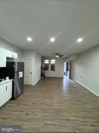 a view of a kitchen with a sink