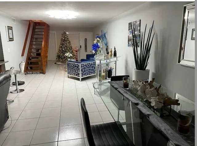 a room with gym equipment and large equipment