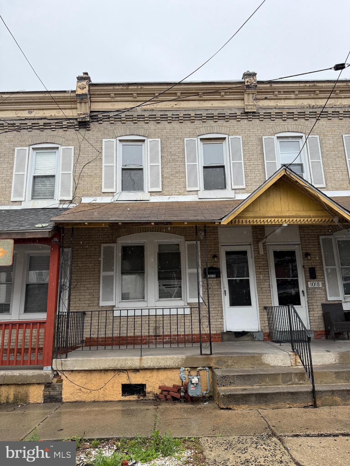 a front view of a house with a garage
