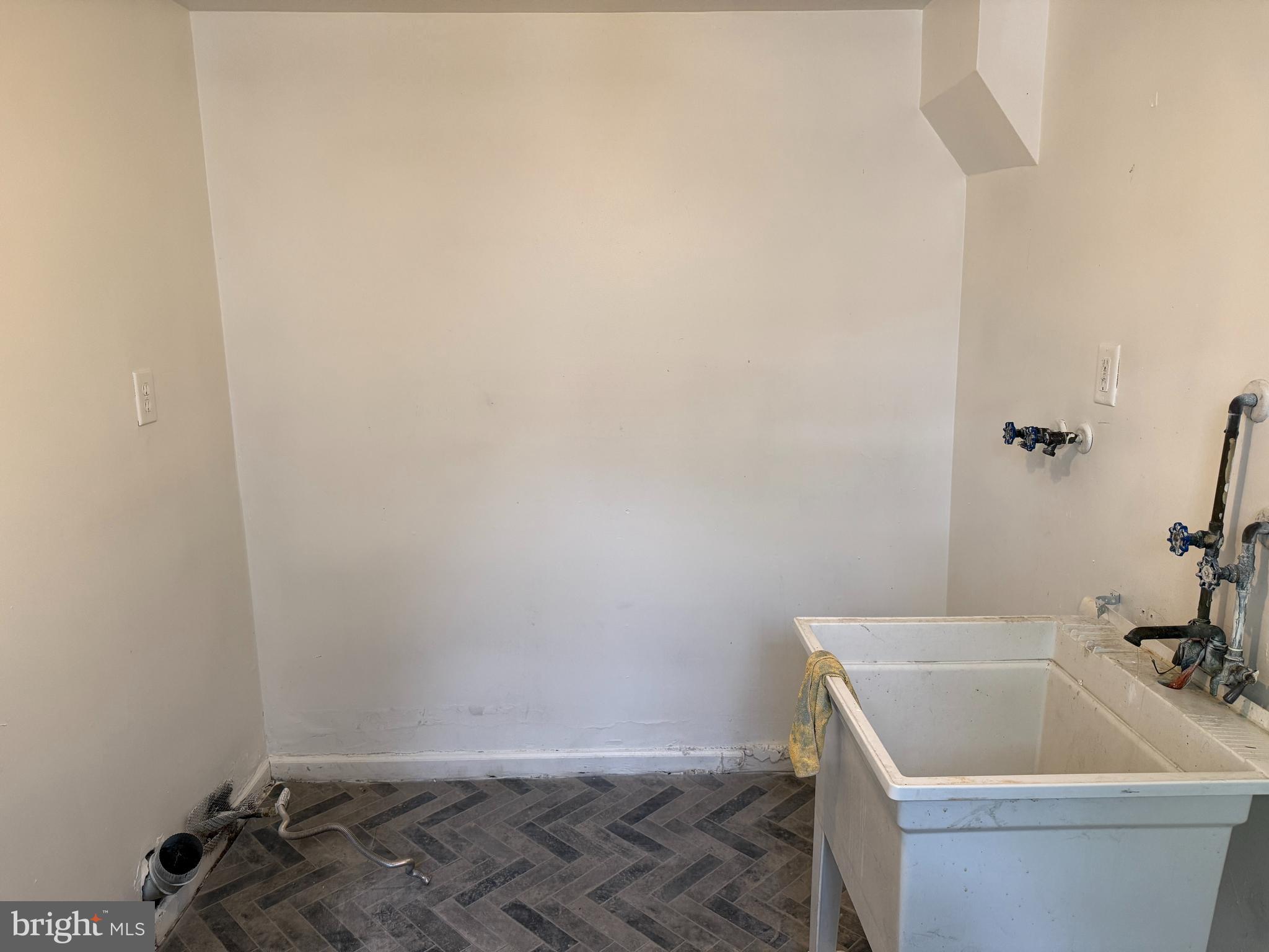 1016 Potter Street Chester, PA 19013 - Photo 11 of 22 a bathroom with a bathtub and toilet