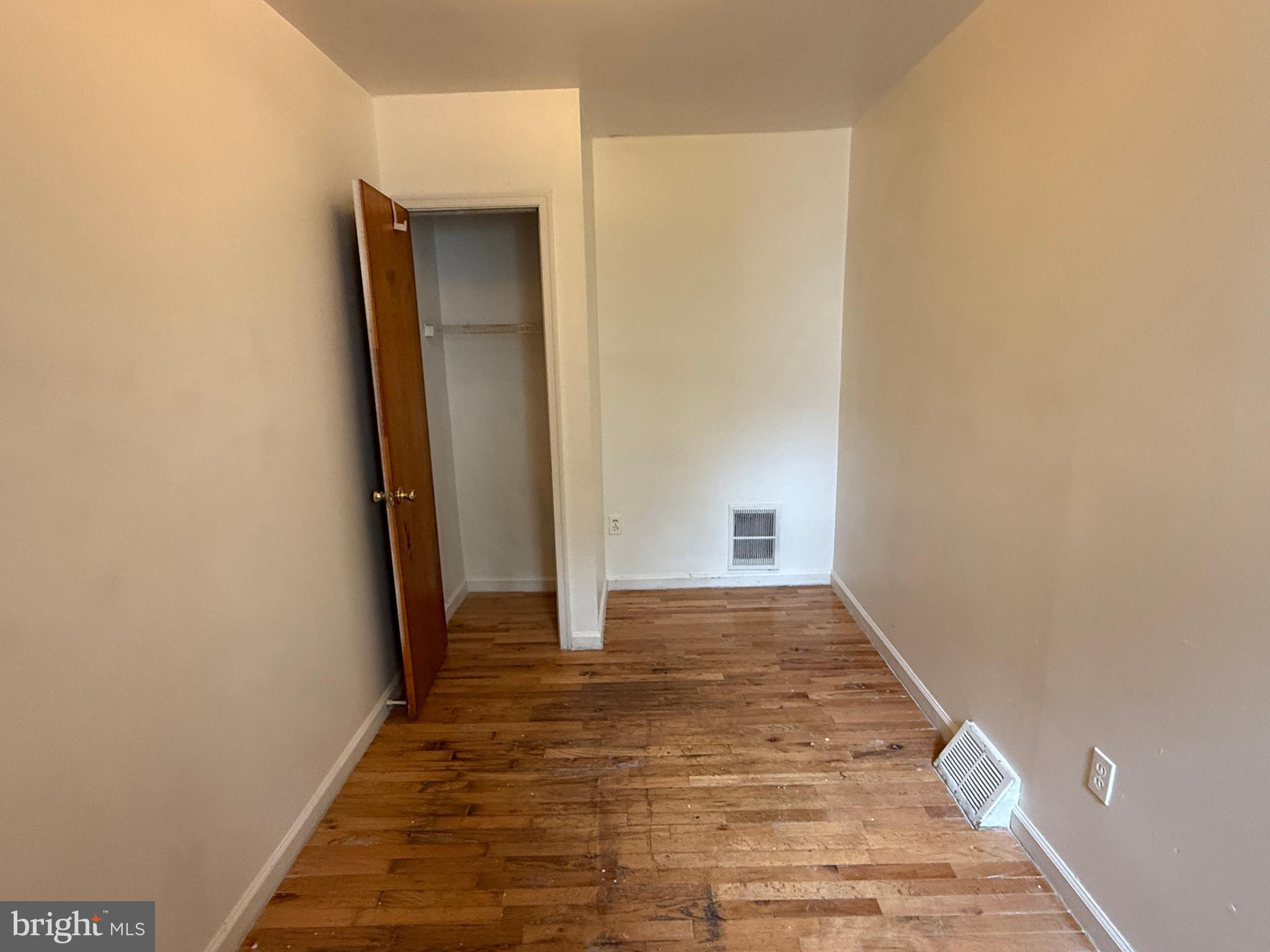 1016 Potter Street Chester, PA 19013 - Photo 16 of 22 a view of a livingroom with wooden floor