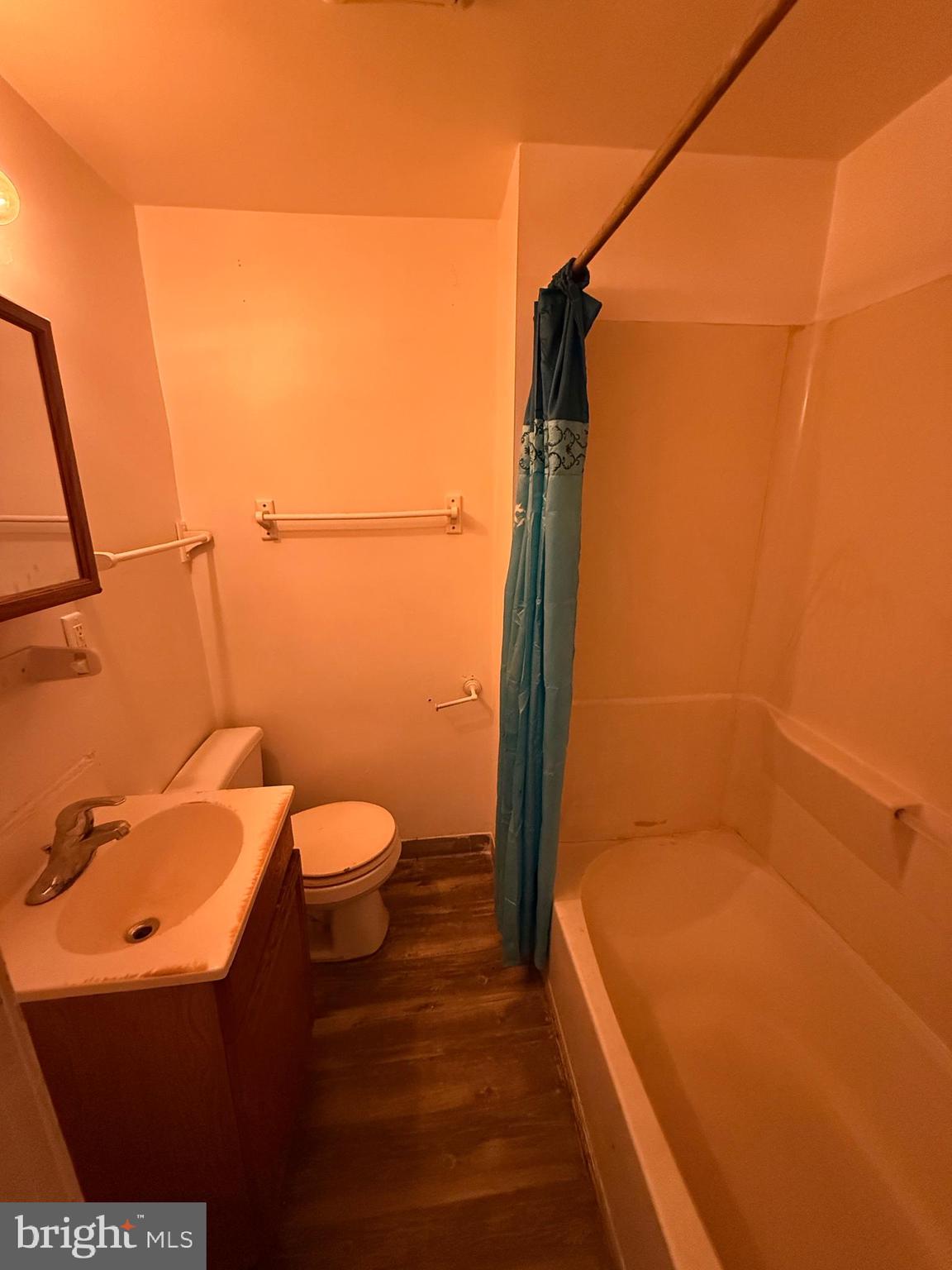 1016 Potter Street Chester, PA 19013 - Photo 22 of 22 a bathroom with a granite countertop sink toilet and shower