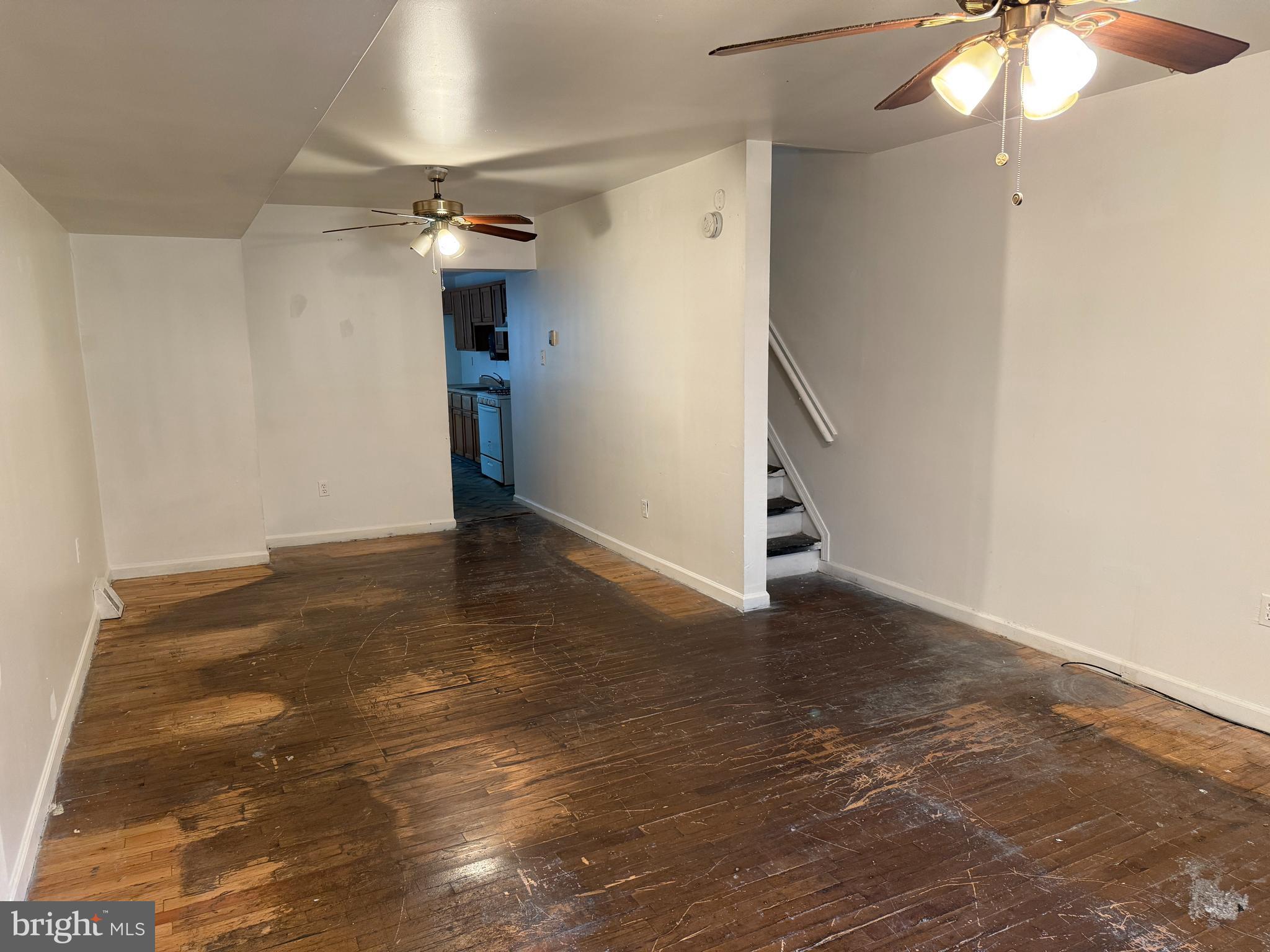 1016 Potter Street Chester, PA 19013 - Photo 3 of 22 an empty room with an entryway and chandelier