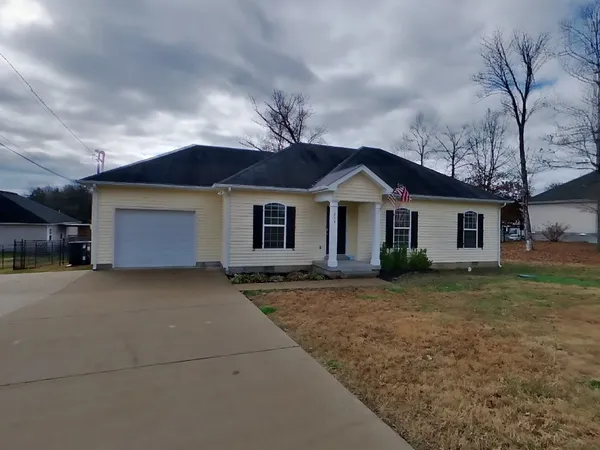 front view of a house and a yard