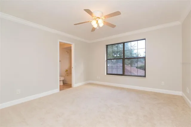 a view of a house with brick walls