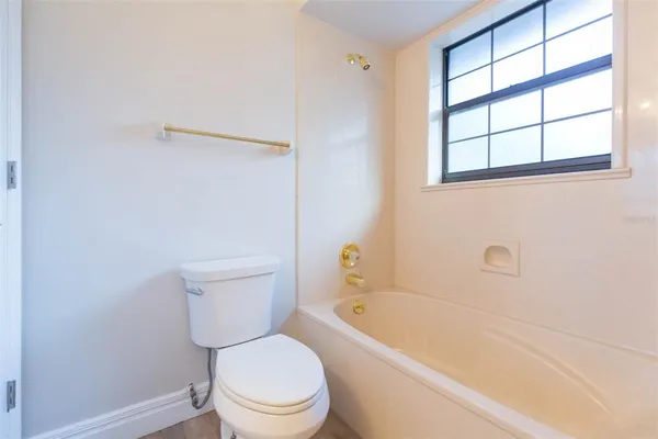 a view of a house with a large window