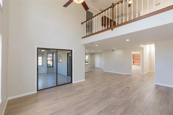 a view of an entryway with wooden floor