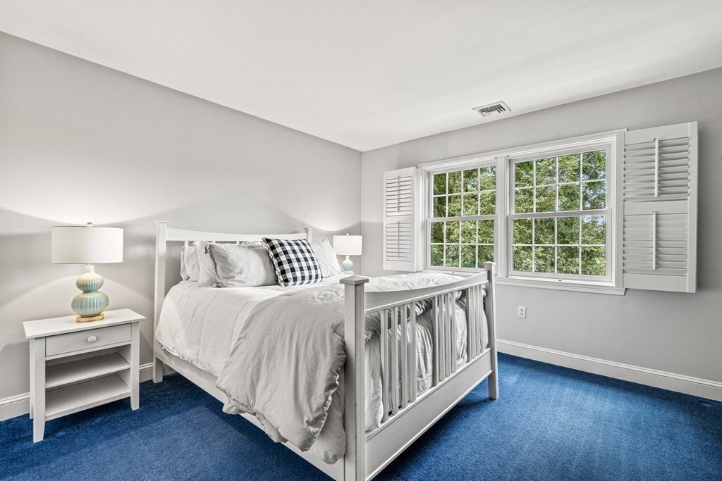 17 Crown Ridge Road Wellesley, MA 02482 - Photo 23 of 37 a bedroom with a bed and a window
