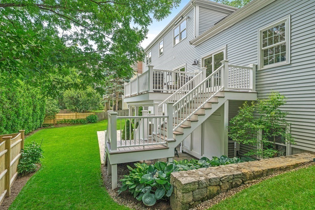 17 Crown Ridge Road Wellesley, MA 02482 - Photo 29 of 37 a view of a house with a yard