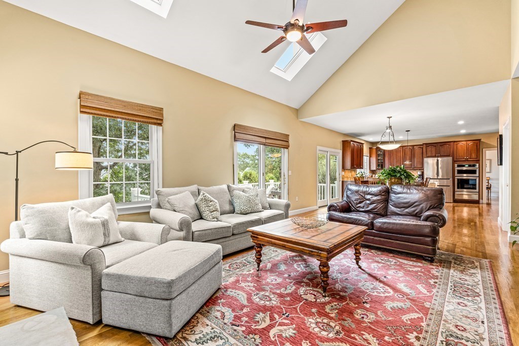17 Crown Ridge Road Wellesley, MA 02482 - Photo 10 of 37 a living room with furniture and a large window