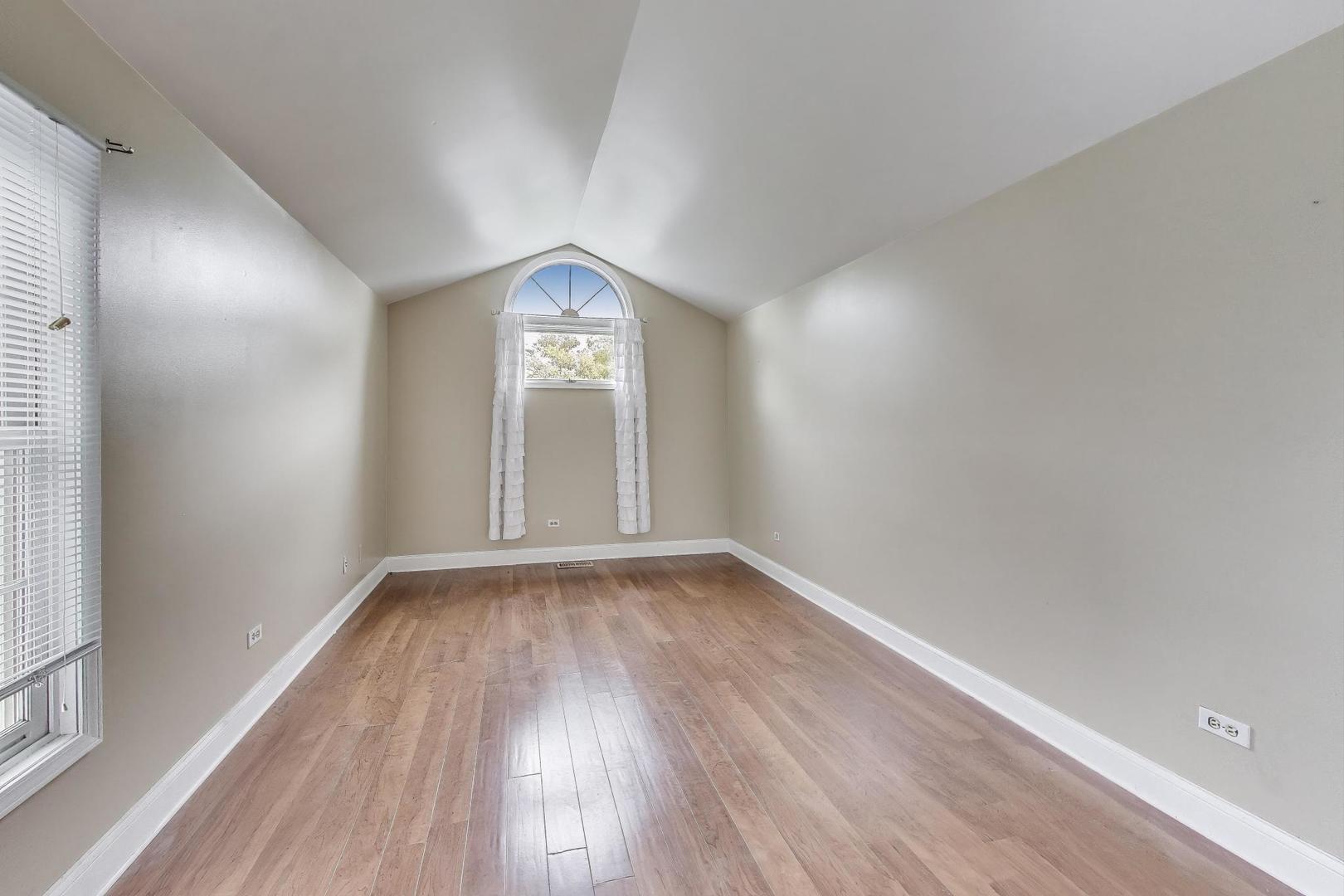 1905 Stillwater Road Arlington Heights, IL 60004 - Photo 20 of 36 wooden floor in an empty room with a window