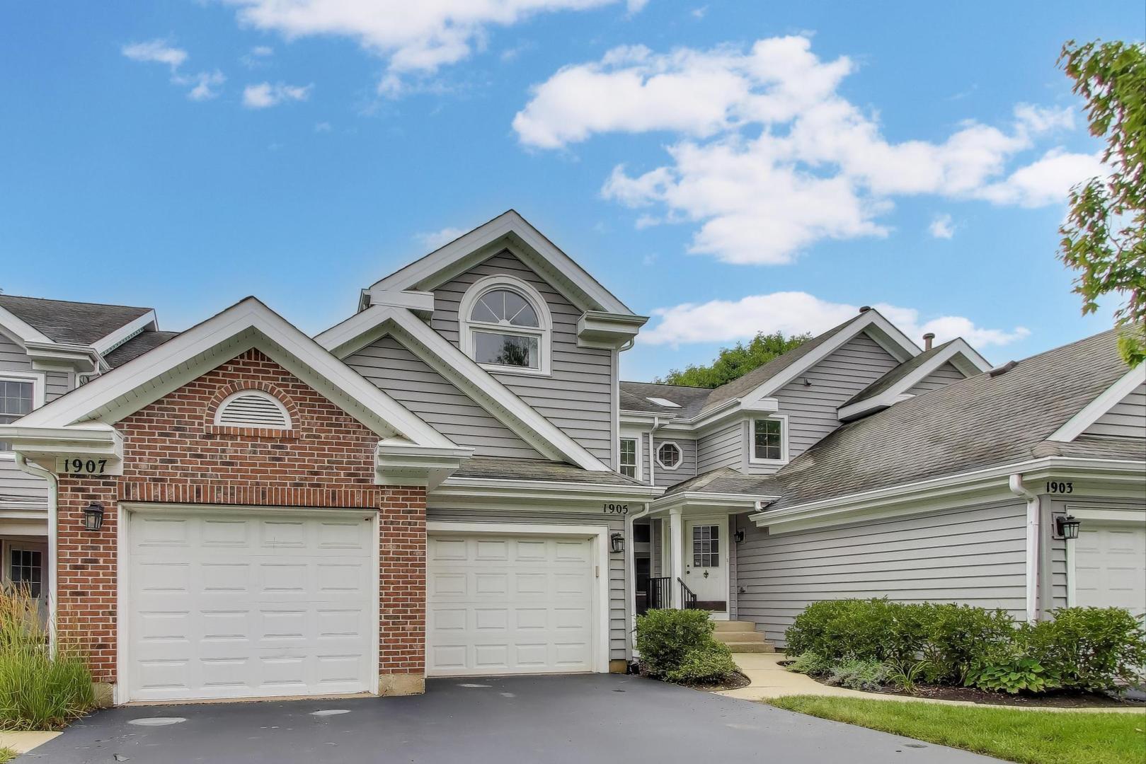 1905 Stillwater Road Arlington Heights, IL 60004 - Photo 2 of 36 a front view of a house with garden