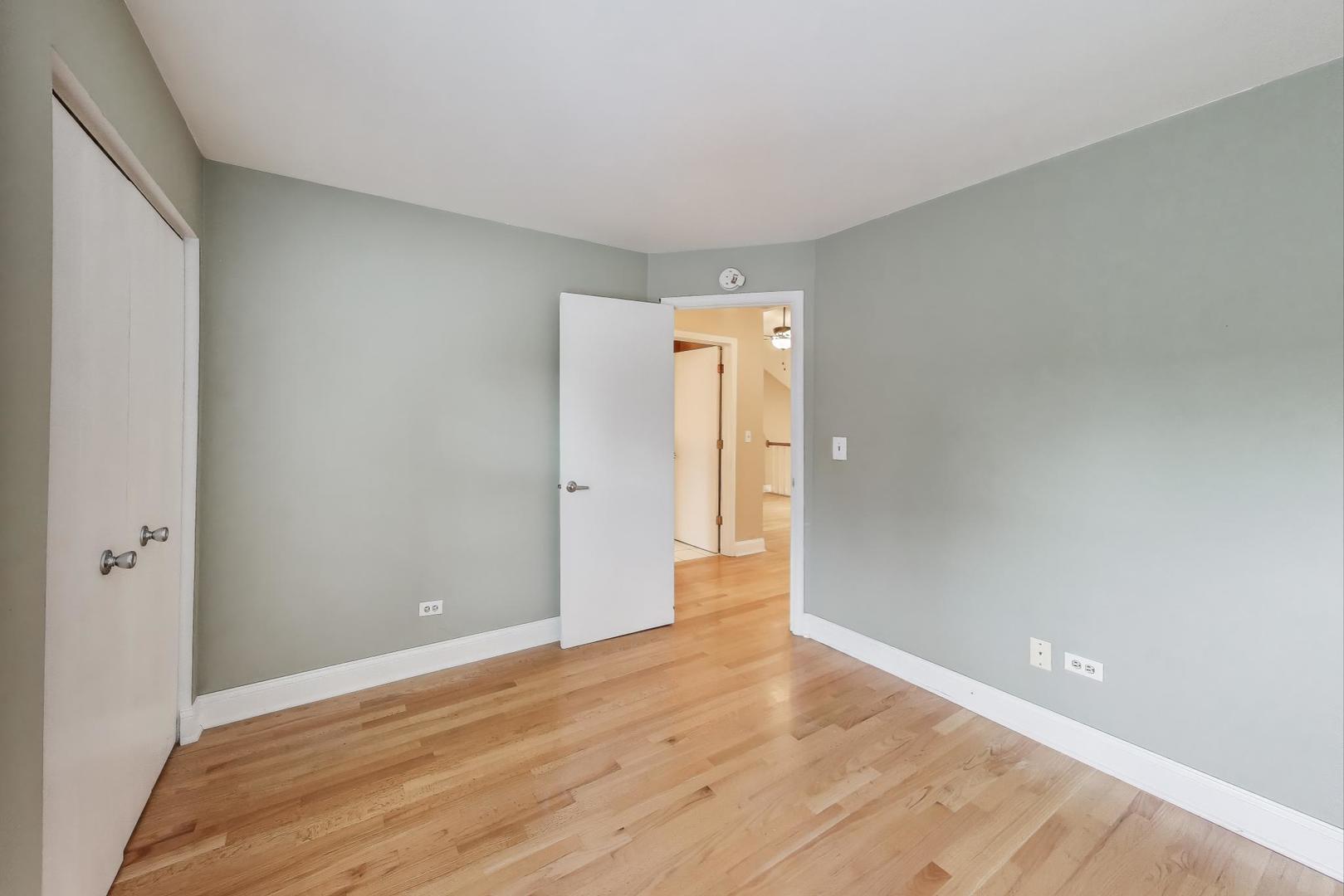 1905 Stillwater Road Arlington Heights, IL 60004 - Photo 25 of 36 a view of an empty room and wooden floor