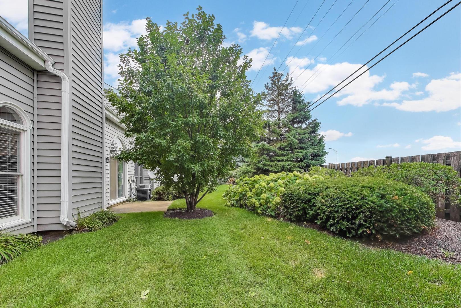 1905 Stillwater Road Arlington Heights, IL 60004 - Photo 28 of 36 a view of a backyard with a garden