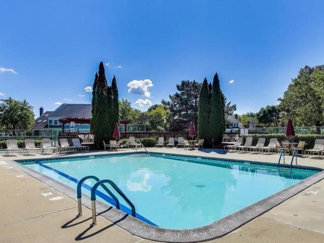 1905 Stillwater Road Arlington Heights, IL 60004 - Photo 30 of 36 a view of a swimming pool with outdoor seating