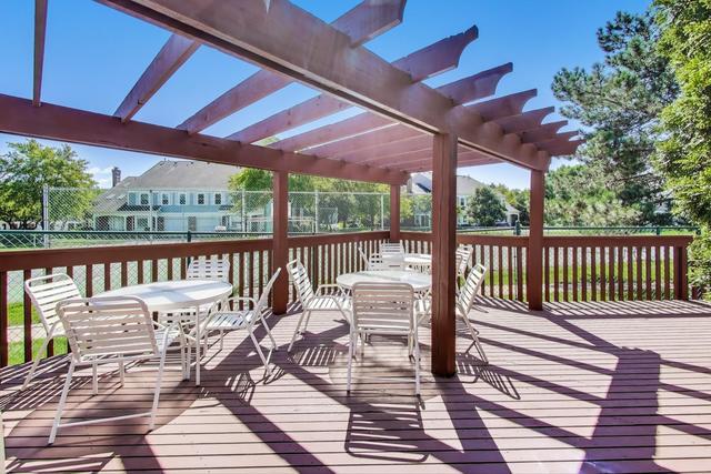 1905 Stillwater Road Arlington Heights, IL 60004 - Photo 32 of 36 a view of balcony with wooden floor and outdoor space