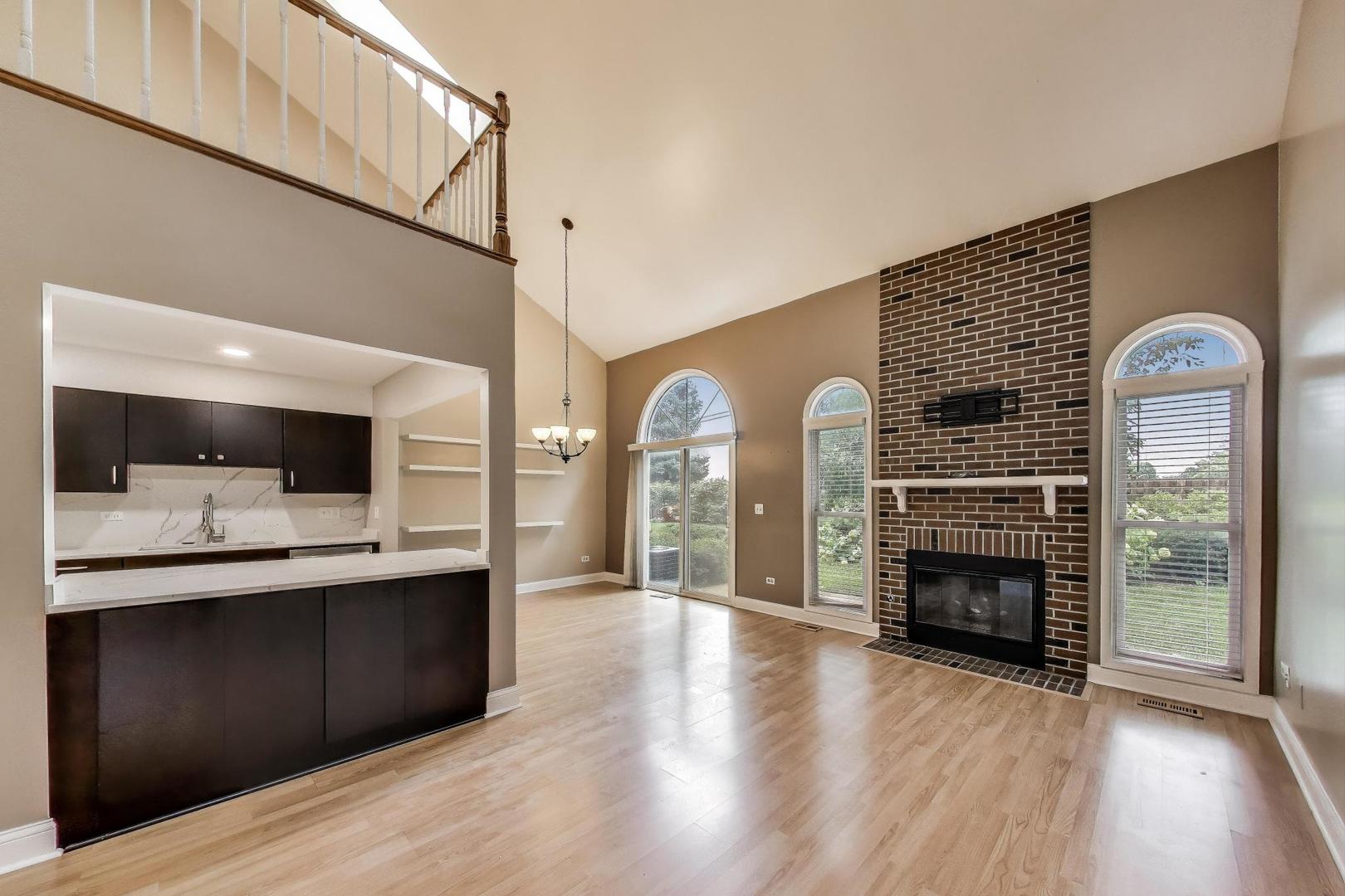 1905 Stillwater Road Arlington Heights, IL 60004 - Photo 6 of 36 a view of living room with furniture and fireplace