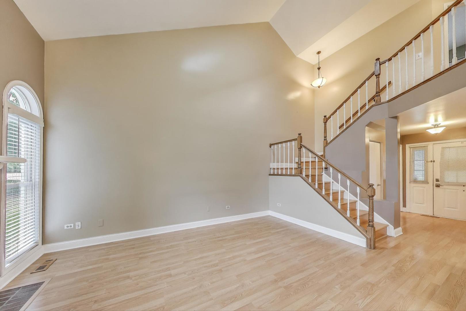 1905 Stillwater Road Arlington Heights, IL 60004 - Photo 8 of 36 a view of an entryway with wooden floor
