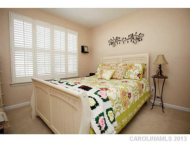 524 Bent Leaf Court Fort Mill, SC 29708 - Photo 14 of 16 a bedroom with a bed and a window