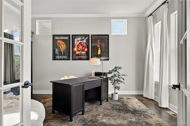 a view of a livingroom with furniture and window