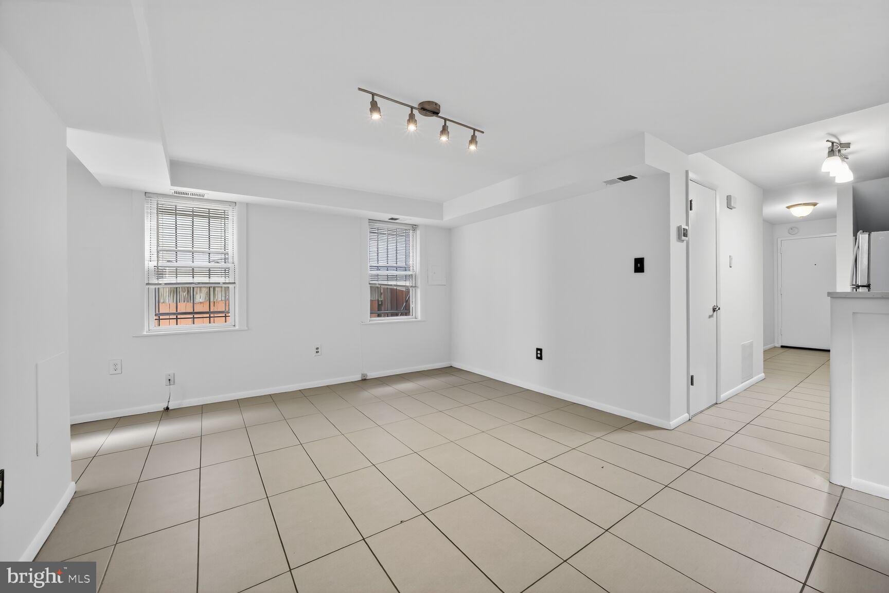 511 P Street Northwest, Unit 2 Washington, DC 20001 - Photo 4 of 15 a view of an empty room and window