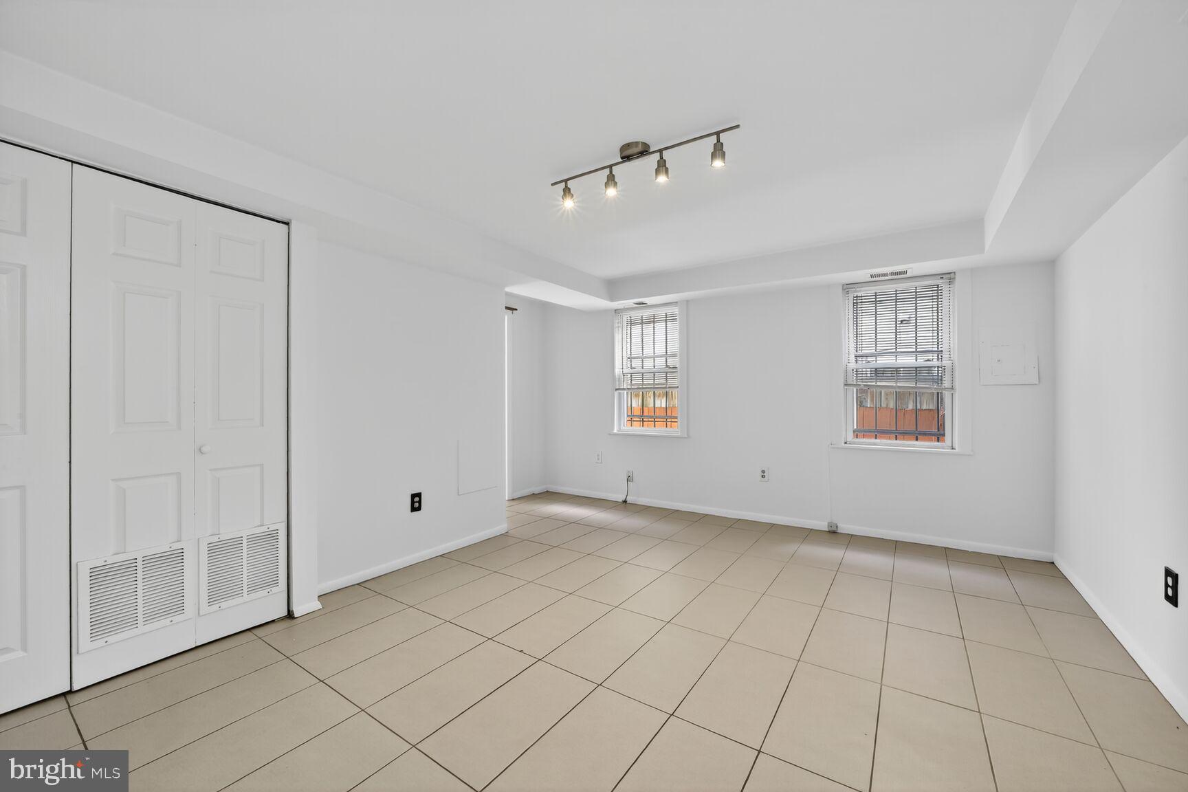 511 P Street Northwest, Unit 2 Washington, DC 20001 - Photo 5 of 15 a view of an empty room with a window