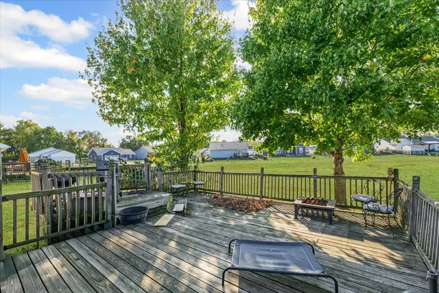 a view of a wooden deck with a bench