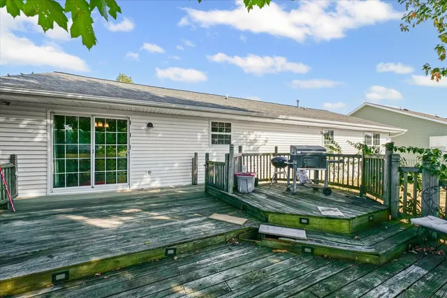 a view of a backyard with sitting area