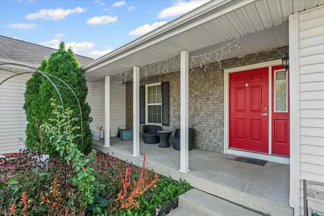 a front view of a house with a porch