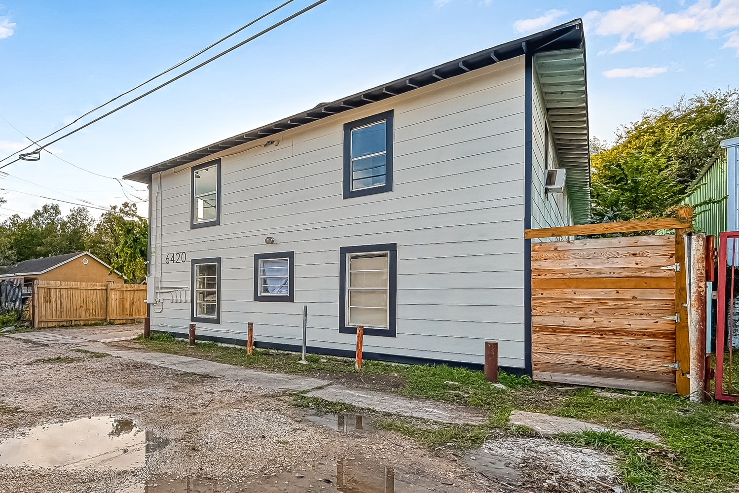 6420 Conley Street, Unit 4 Houston, TX 77021 - Photo 3 of 27 a view of a house with a backyard
